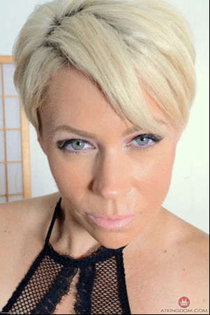 Mature blond Helena showing off her
